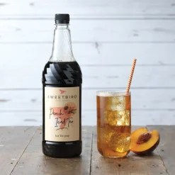 Makusiirappi jääteelle Sweetbird Peach Iced Tea, 1 l