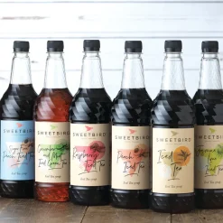 Makusiirappi jääteelle Sweetbird Peach Iced Tea, 1 l